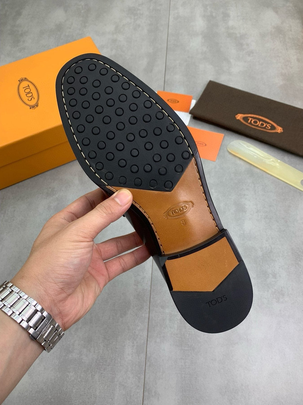 Tod's Black Penny Loafers — detail