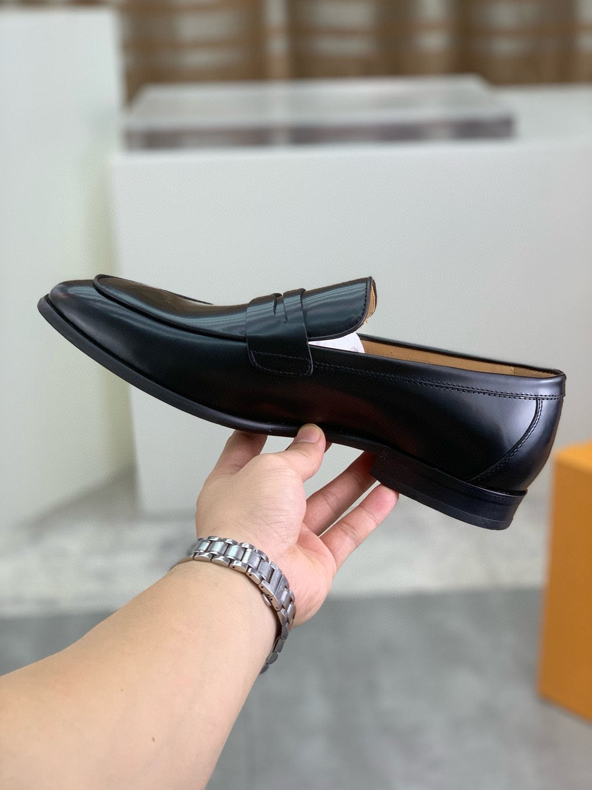 Tod's Black Penny Loafers — side