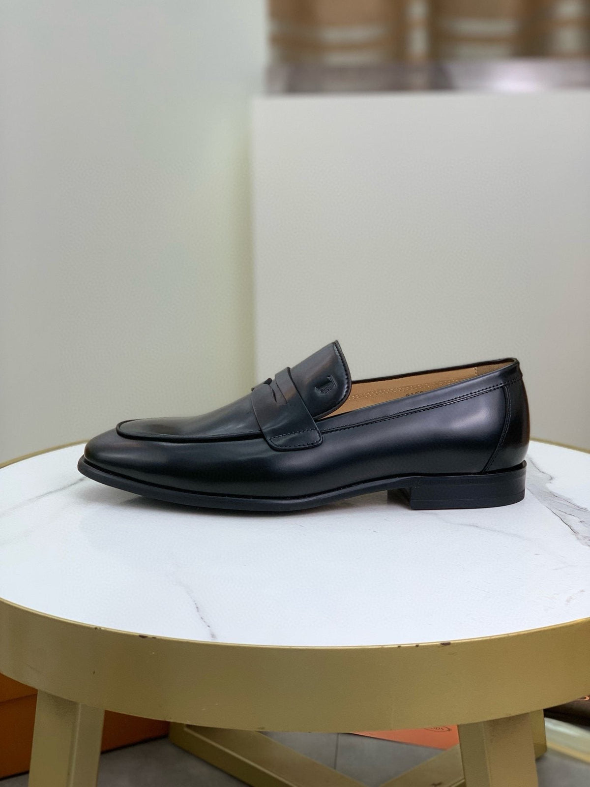 Tod's Black Penny Loafers — side