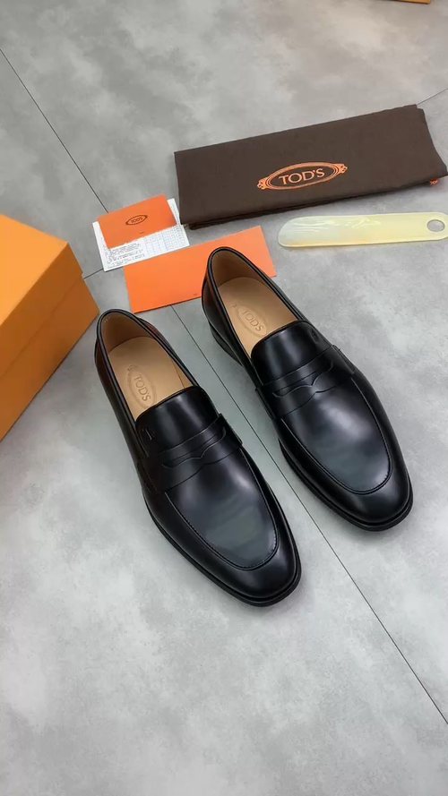 Tod's Black Penny Loafers — front