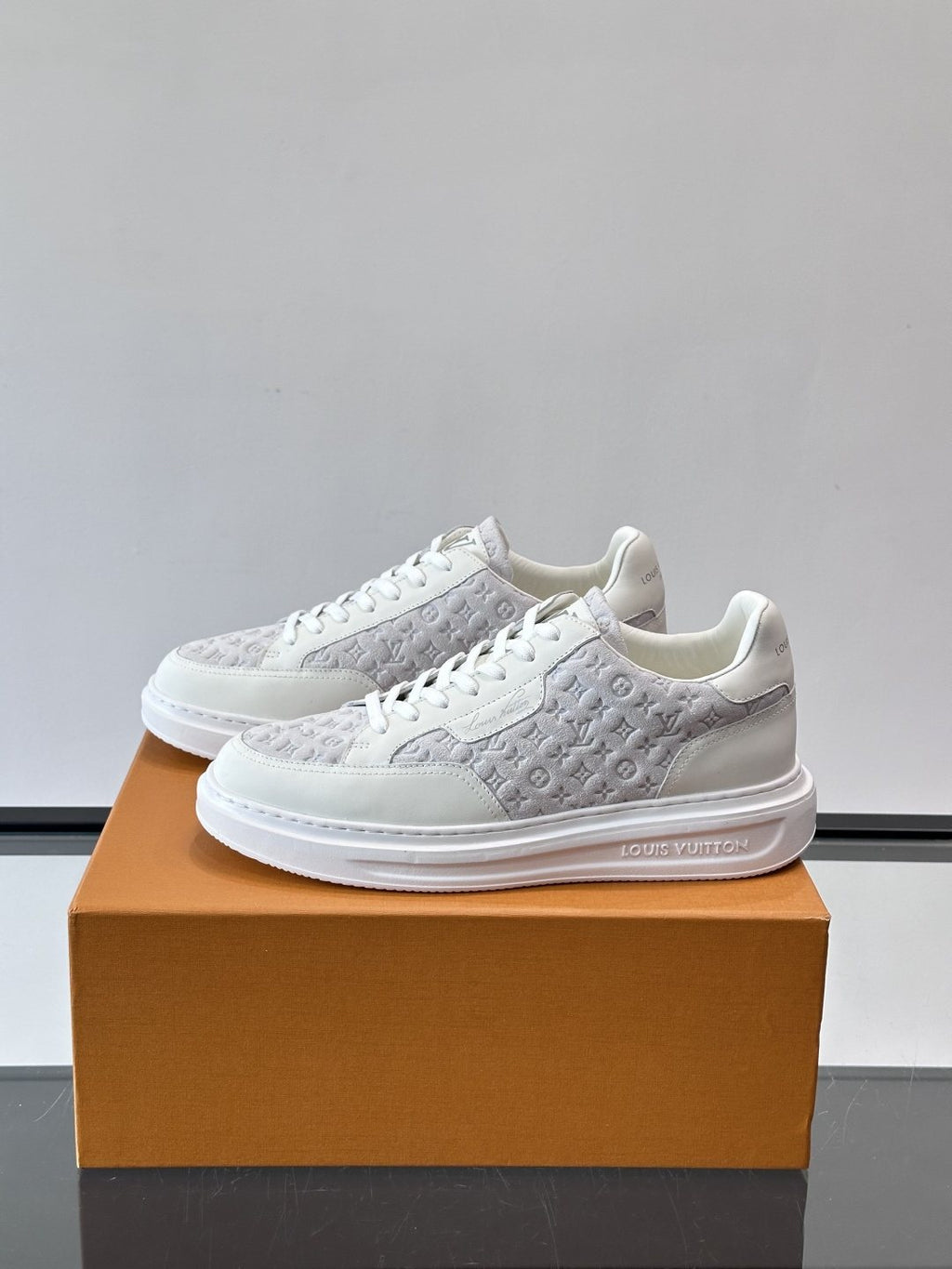 Louis Vuitton Embossed Low-Top Sneakers — side