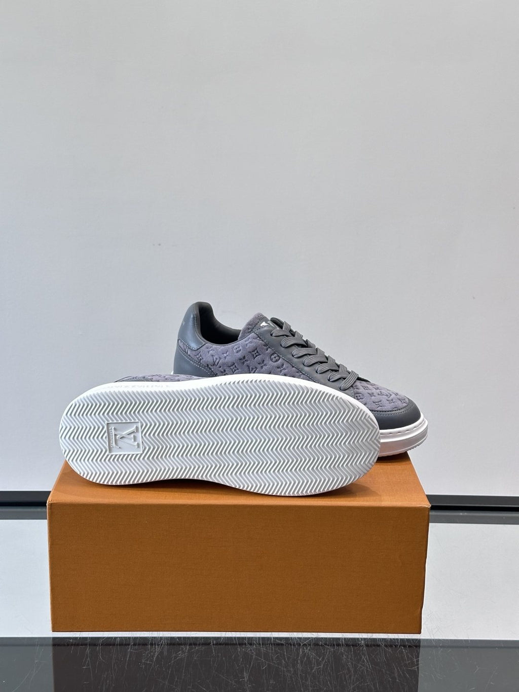 Louis Vuitton Embossed Low-Top Sneakers — side