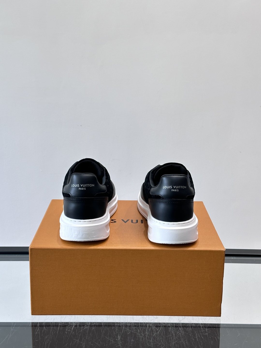 Louis Vuitton Embossed Low-Top Sneakers — back