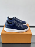 Louis Vuitton Embossed Low-Top Sneakers — front