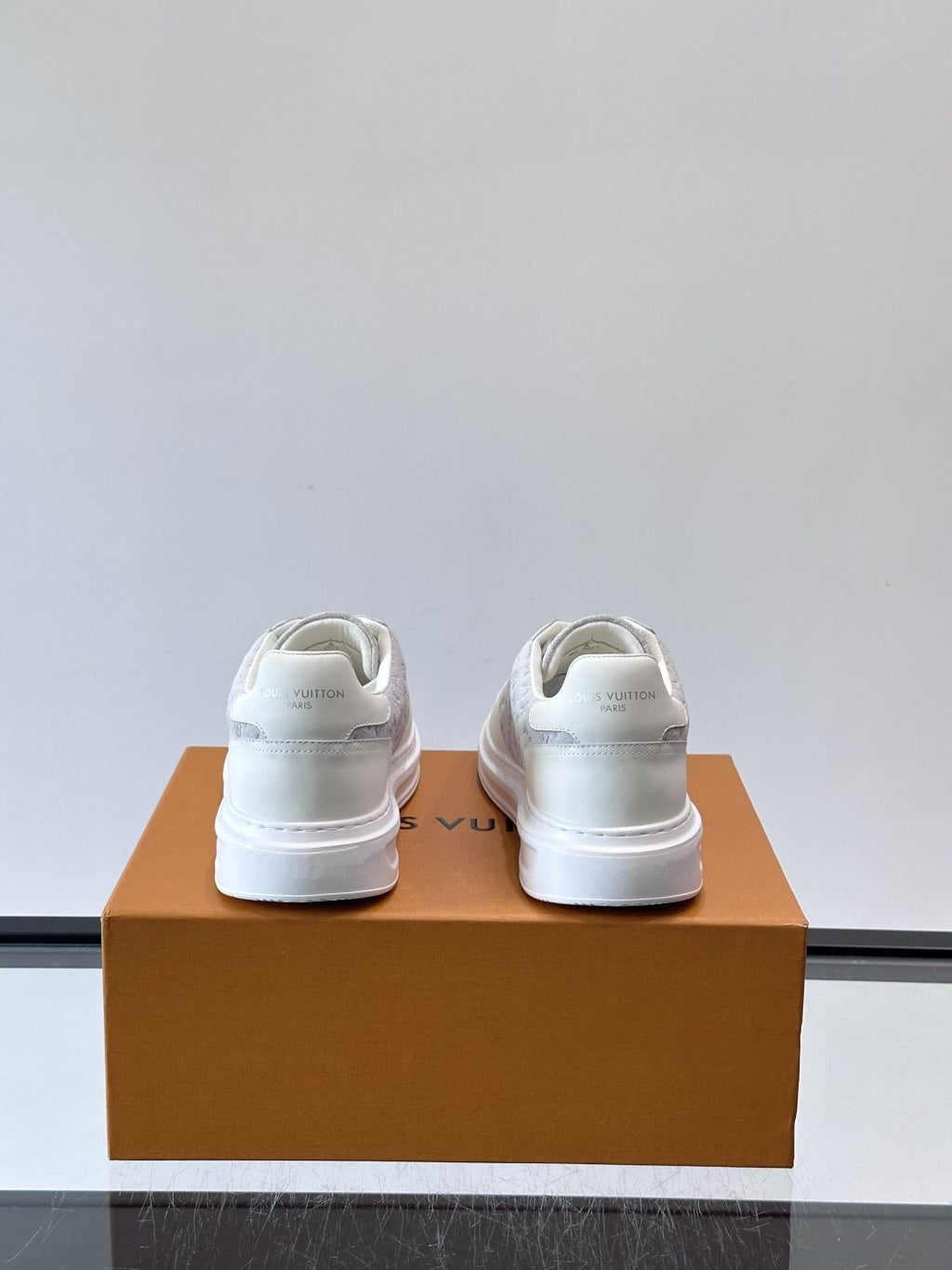 Louis Vuitton Embossed Low-Top Sneakers — back