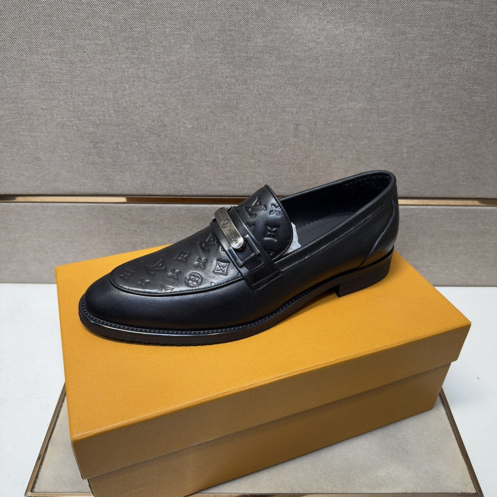 Louis Vuitton Embossed Metal-Bar Loafers — front