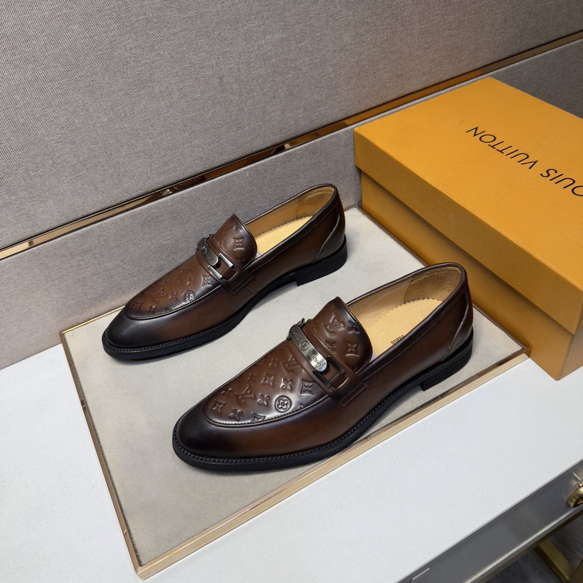 Louis Vuitton Embossed Metal-Bar Loafers — front