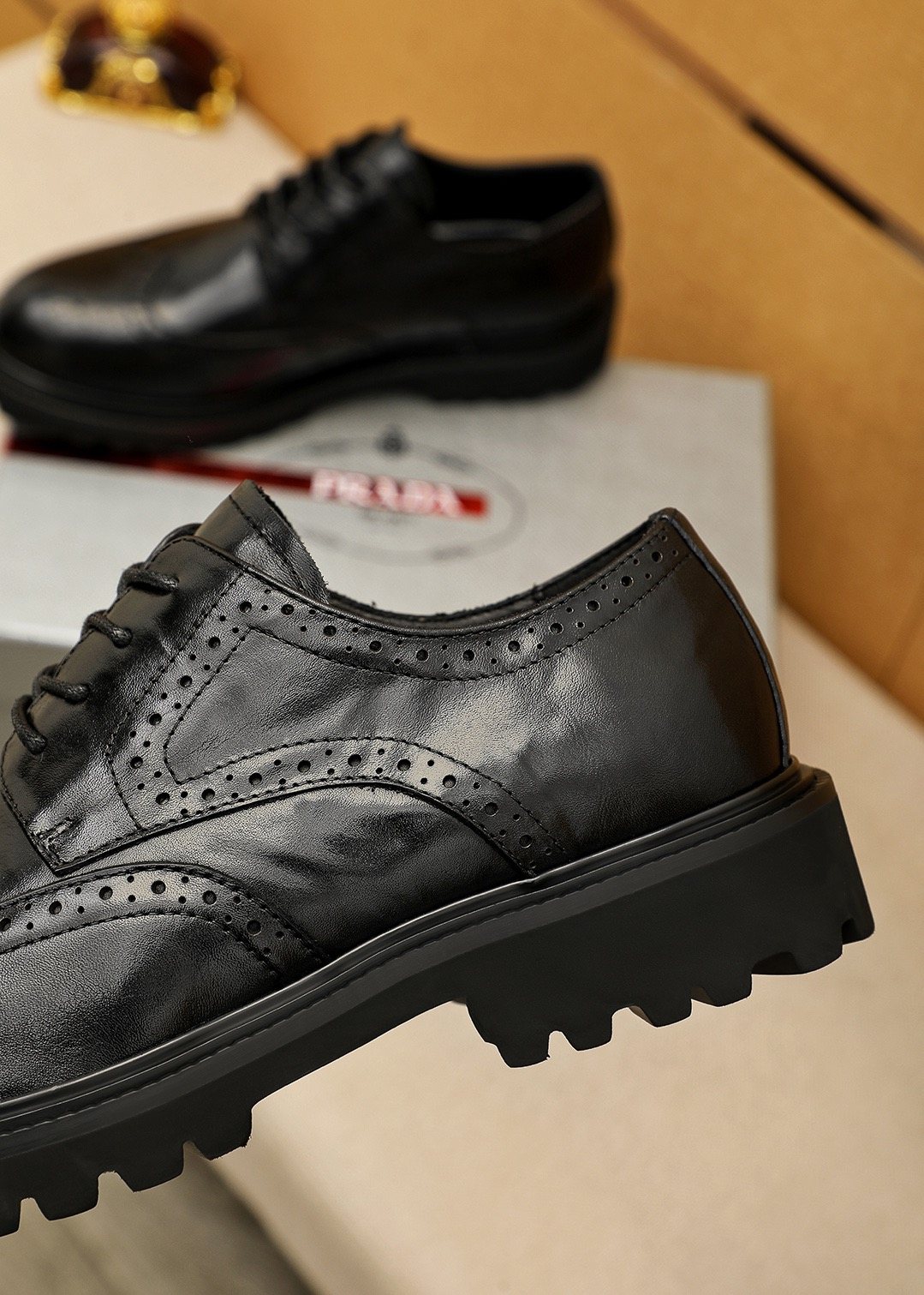 Prada Brogue Lug-Sole Derby Shoes — detail
