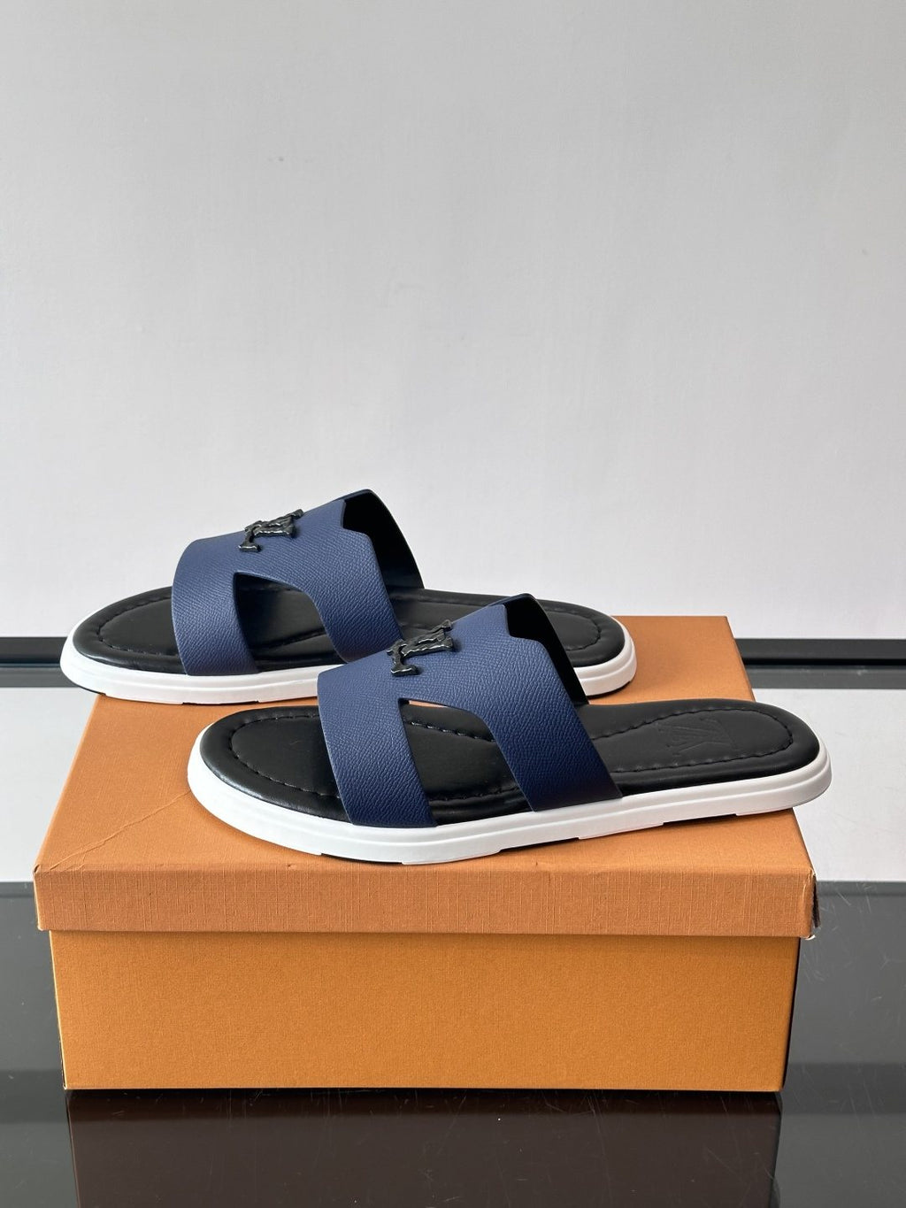 Louis Vuitton Isola Logo Slide Sandals — side