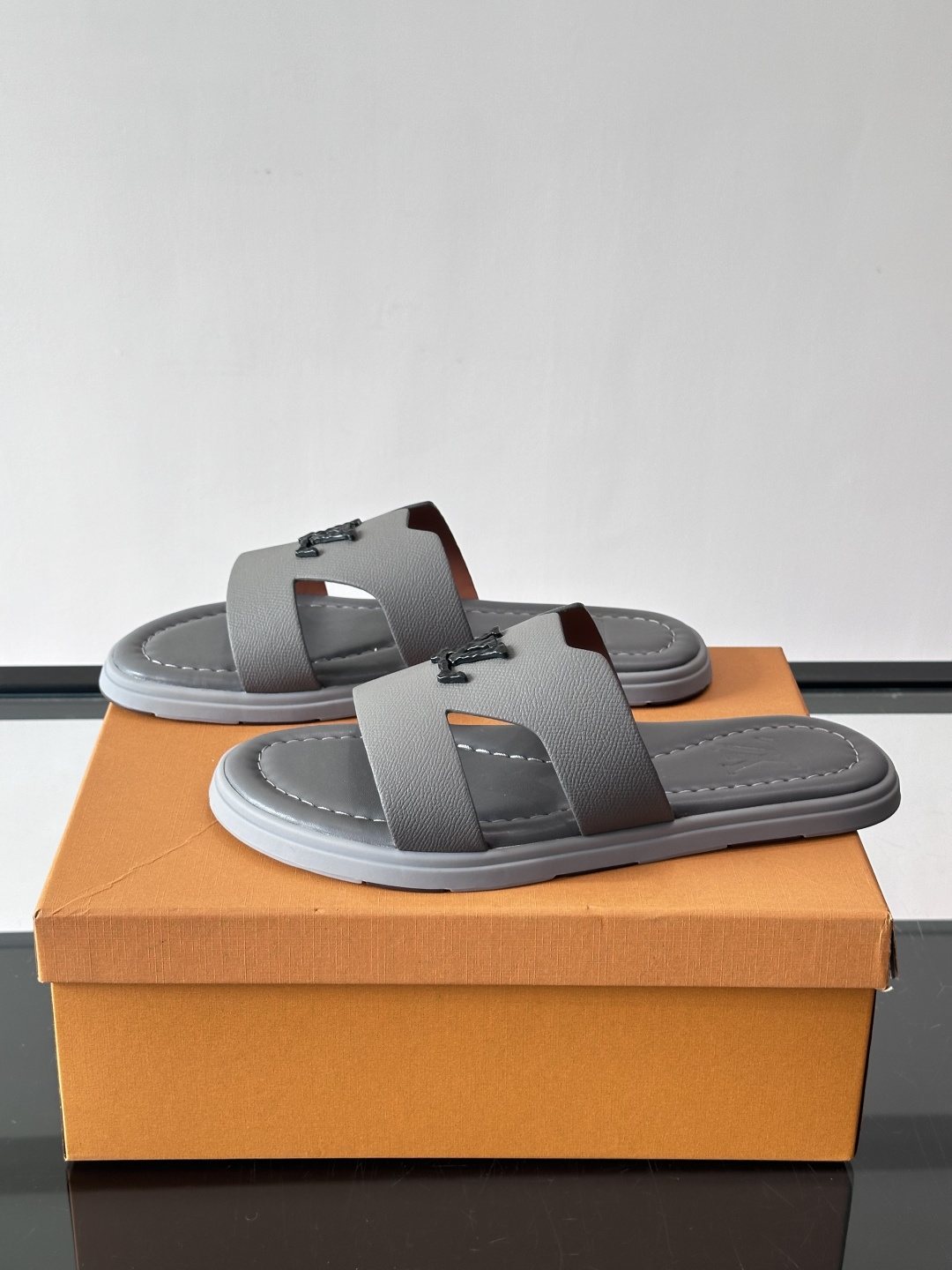 Louis Vuitton Isola Logo Slide Sandals — side