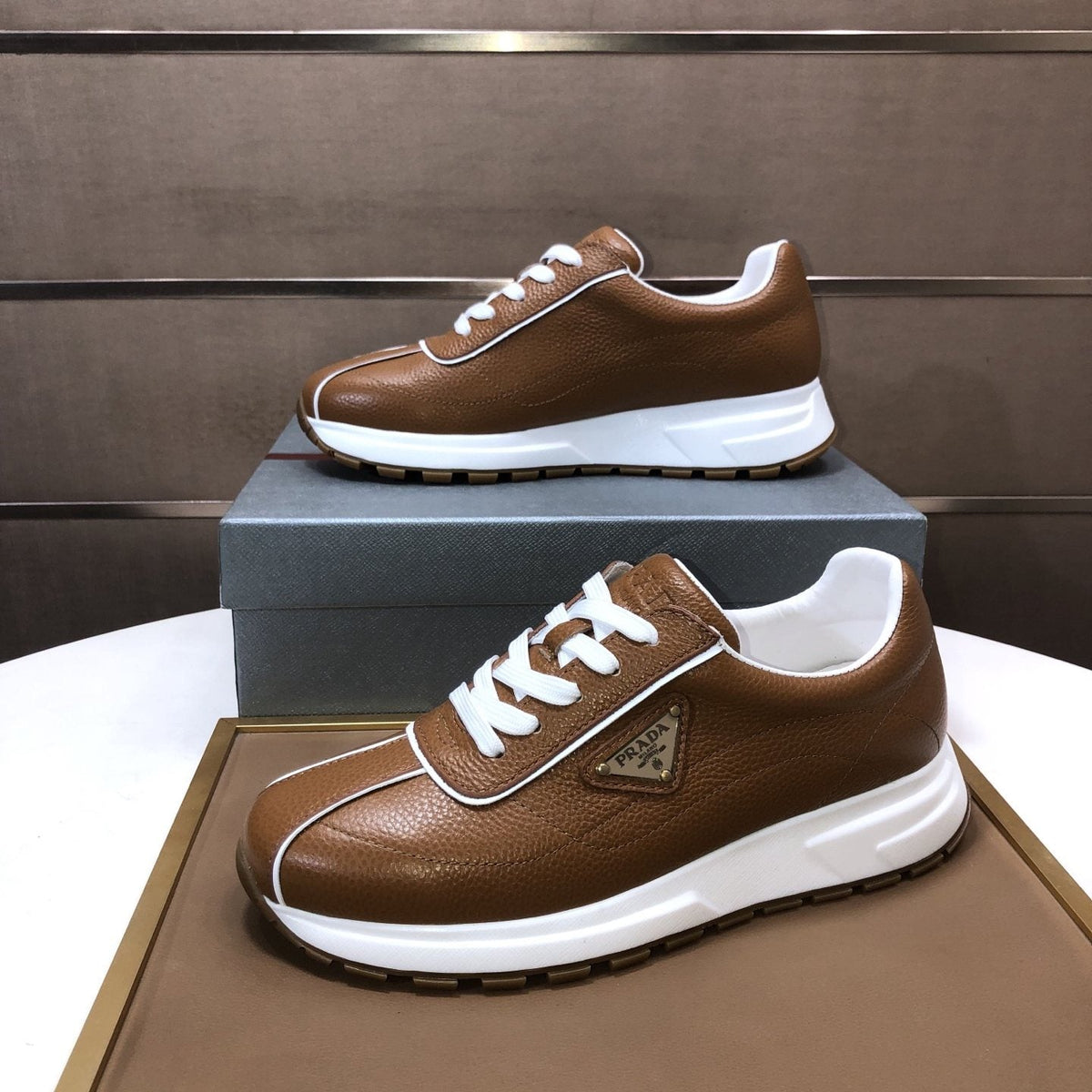 Prada Triangle Plaque Low-Top Sneakers — side