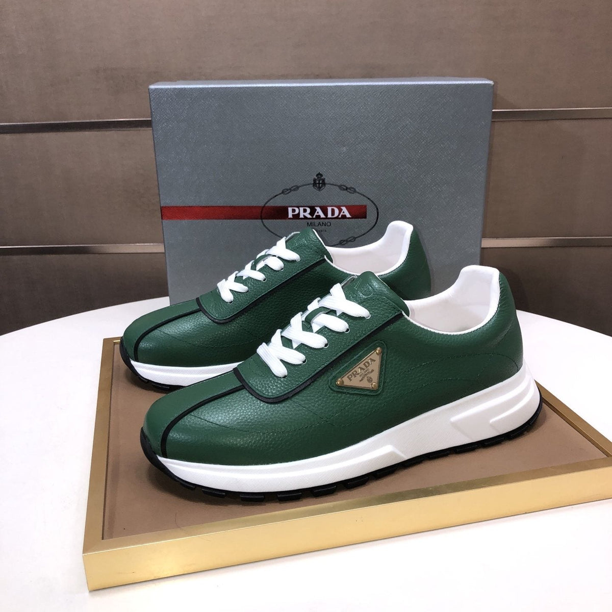 Prada Triangle Plaque Low-Top Sneakers — front