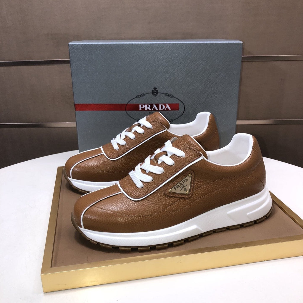 Prada Triangle Plaque Low-Top Sneakers — front
