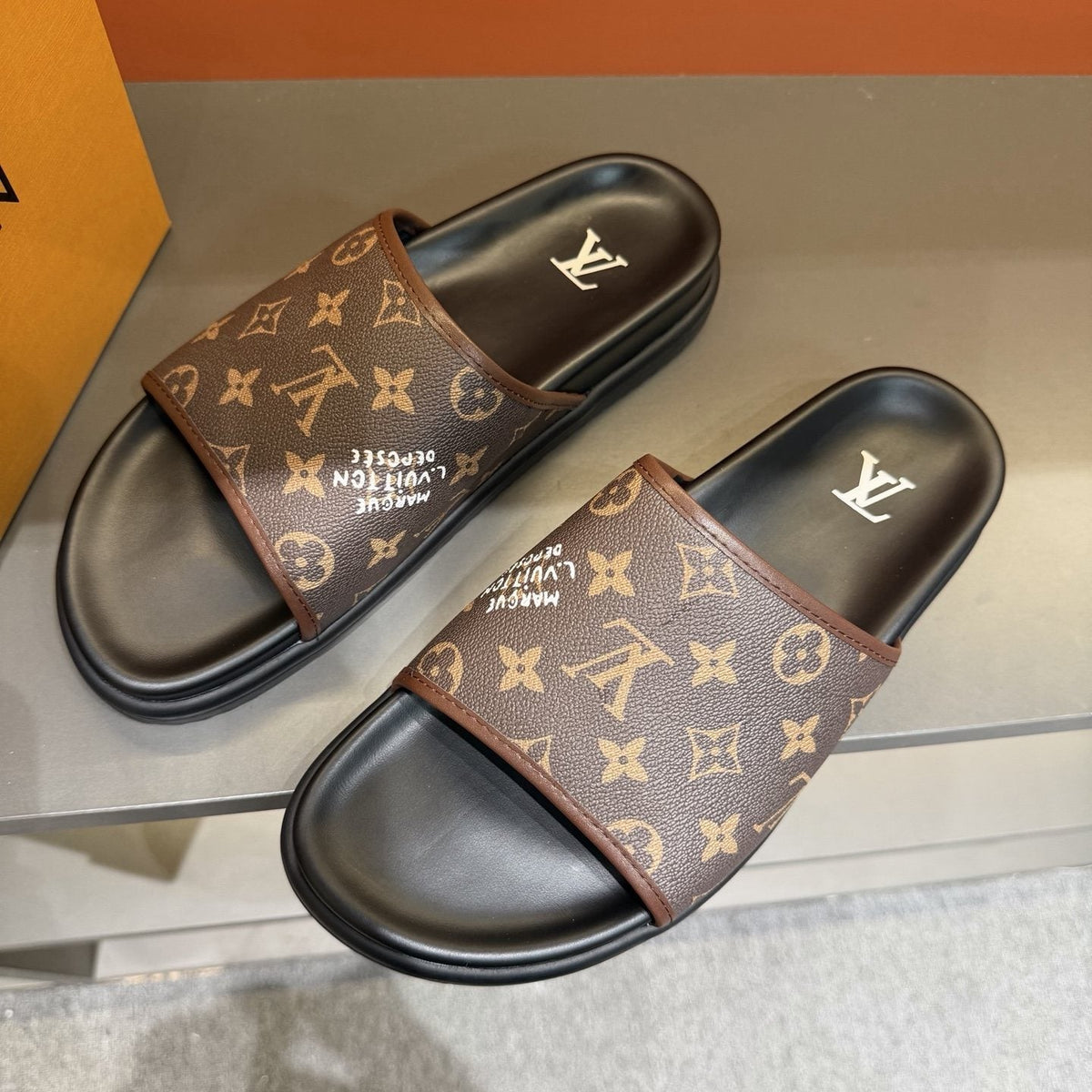 Louis Vuitton Monogram Slide Sandals — detail