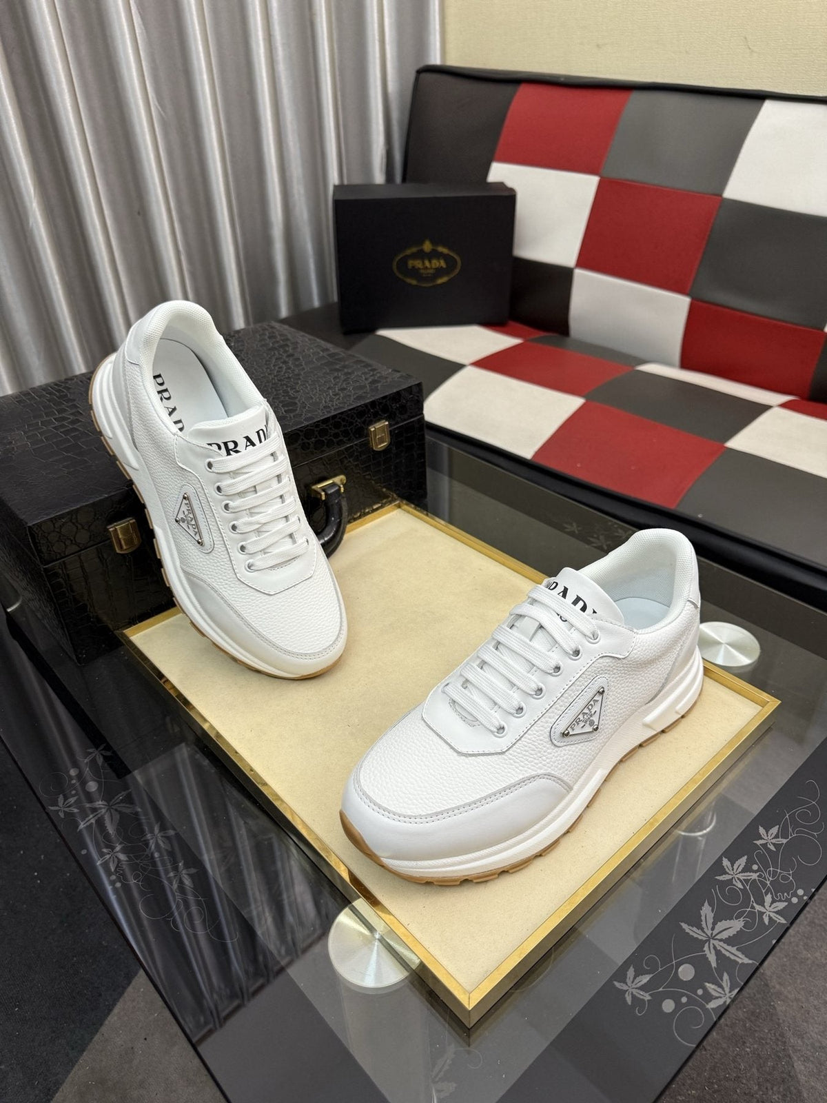 Prada Triangle Badge Low-Top Sneakers — model