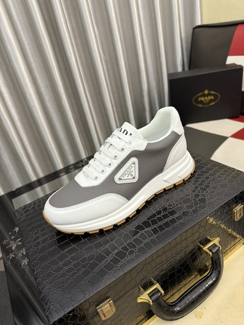 Prada Triangle Badge Low-Top Sneakers — front