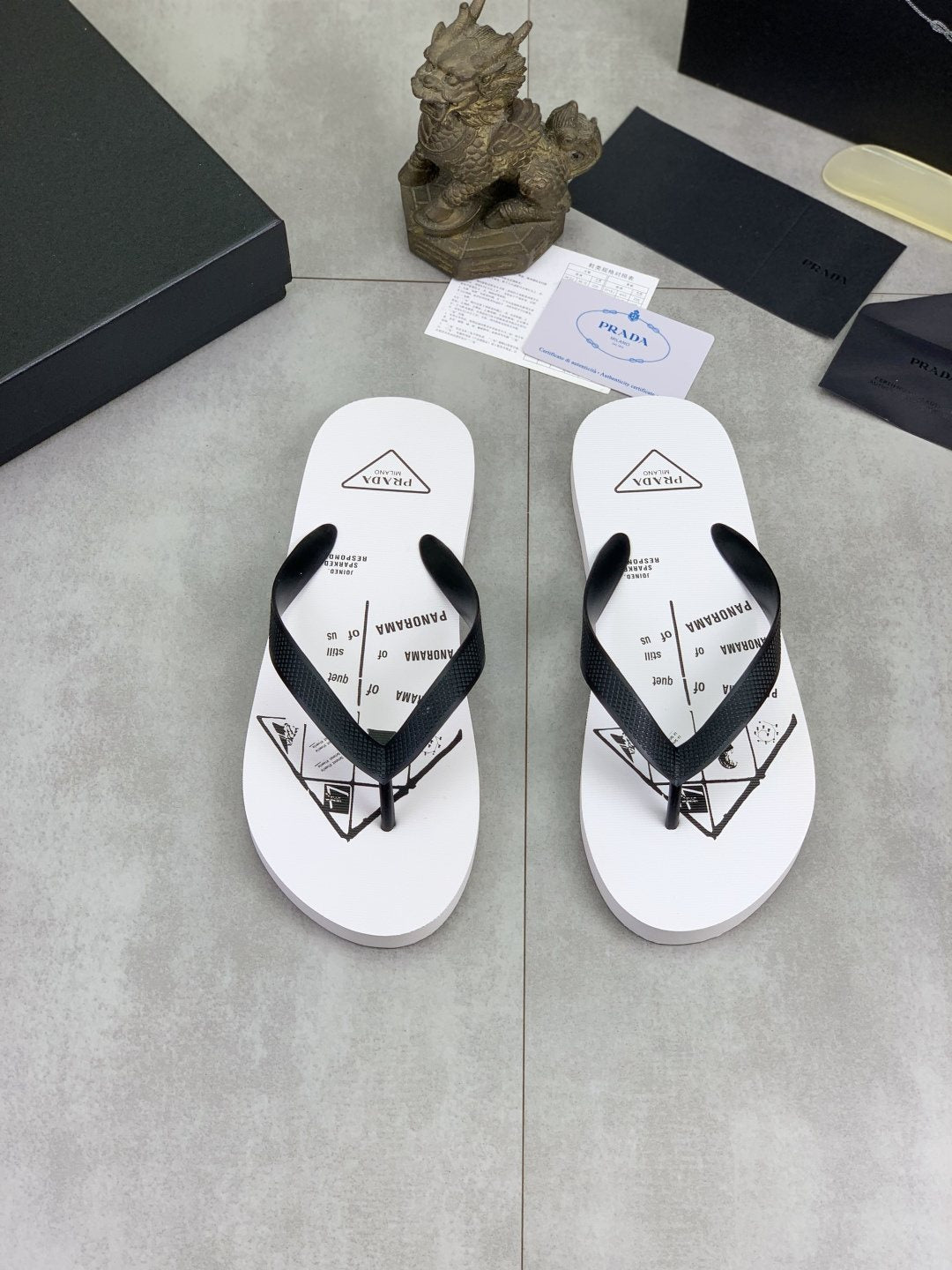 Prada Black Strap White Flip Flops — hero