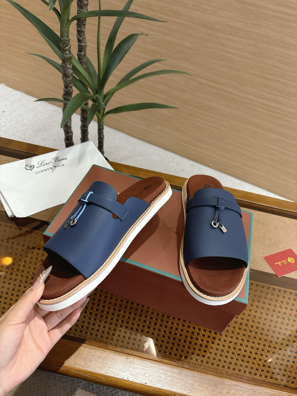 Loro Piana Navy Blue Crisscross Slide Sandals — model
