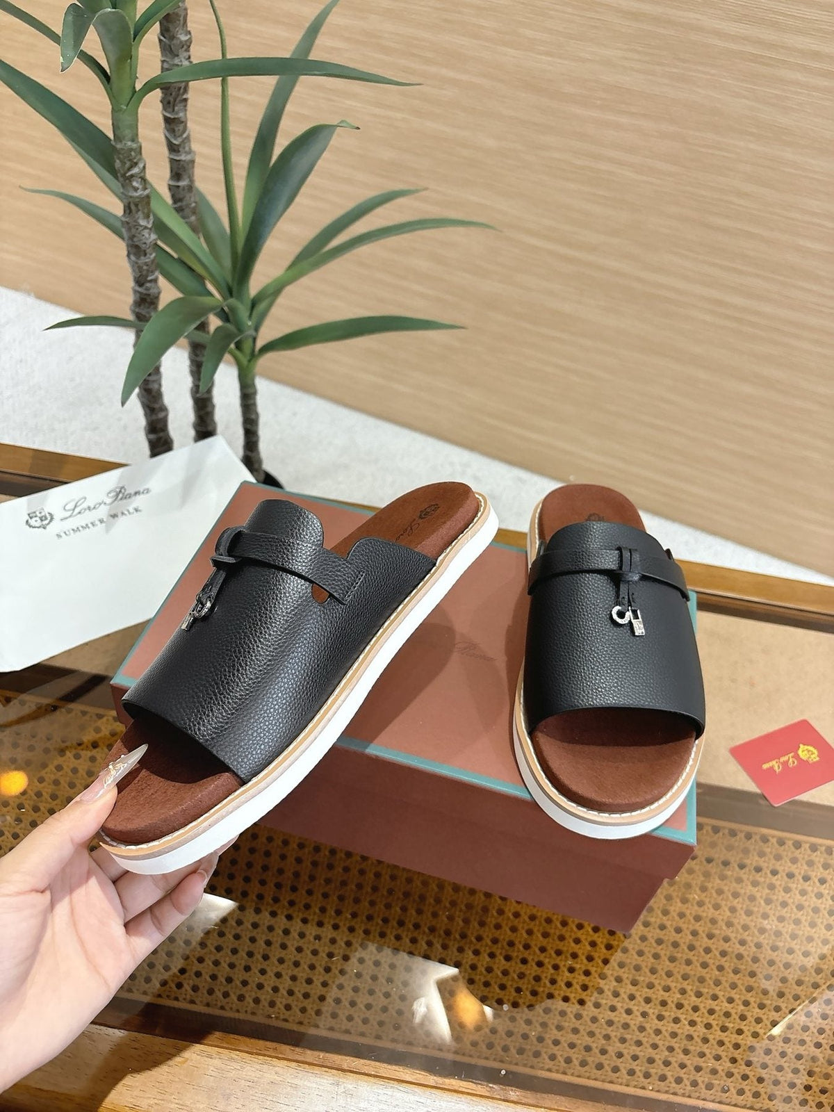 Loro Piana Navy Blue Crisscross Slide Sandals — model