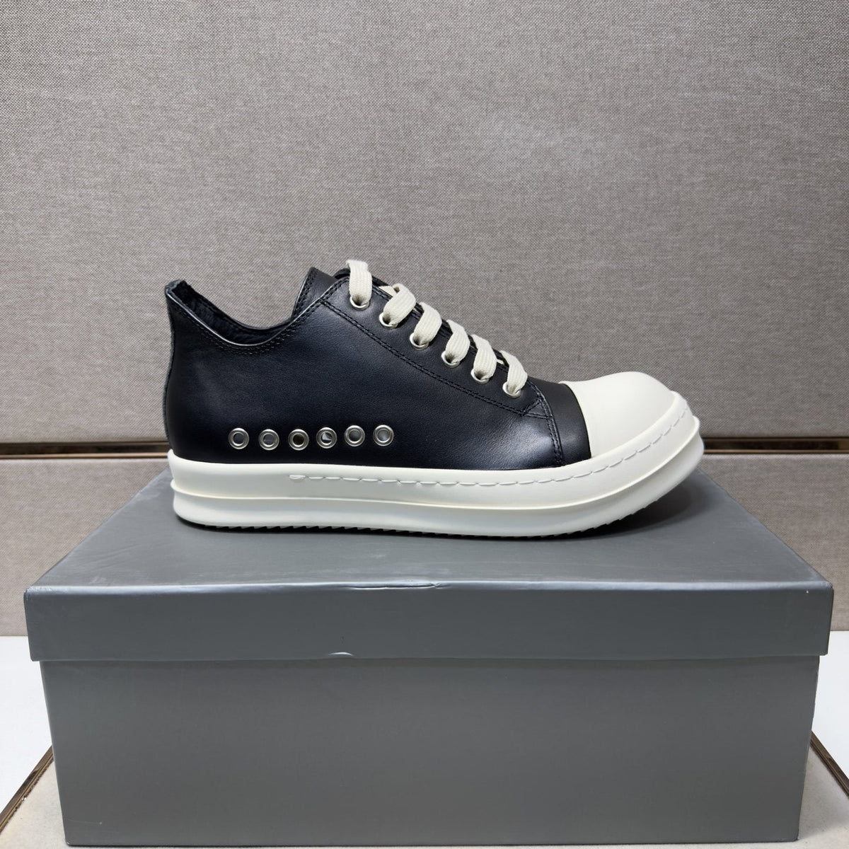 Black and Off-White Low-Top Sneakers — side