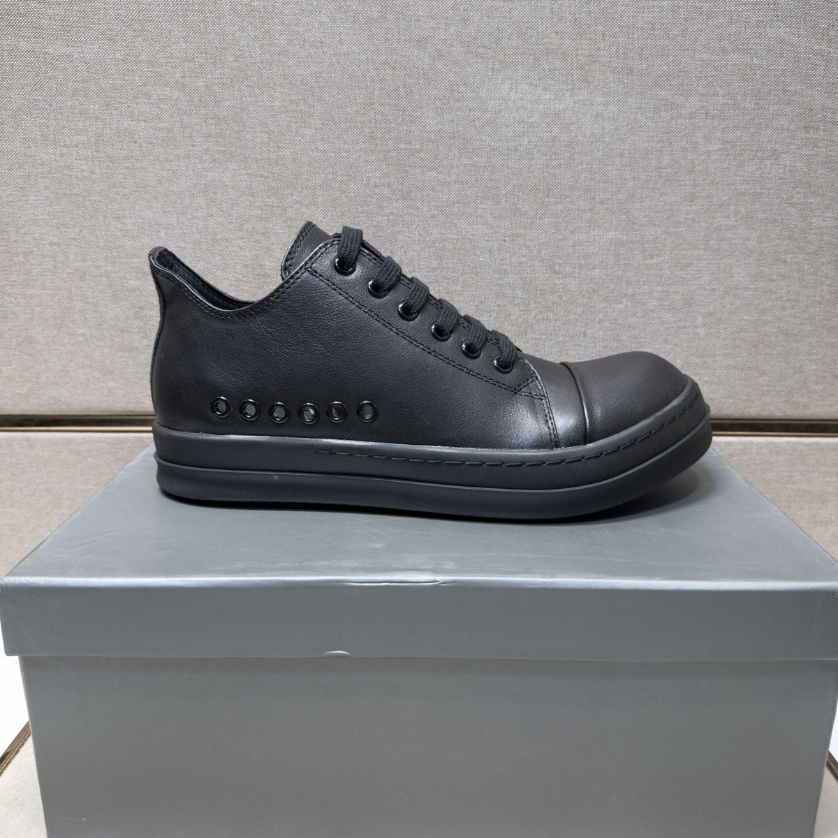 Black and Off-White Low-Top Sneakers — side