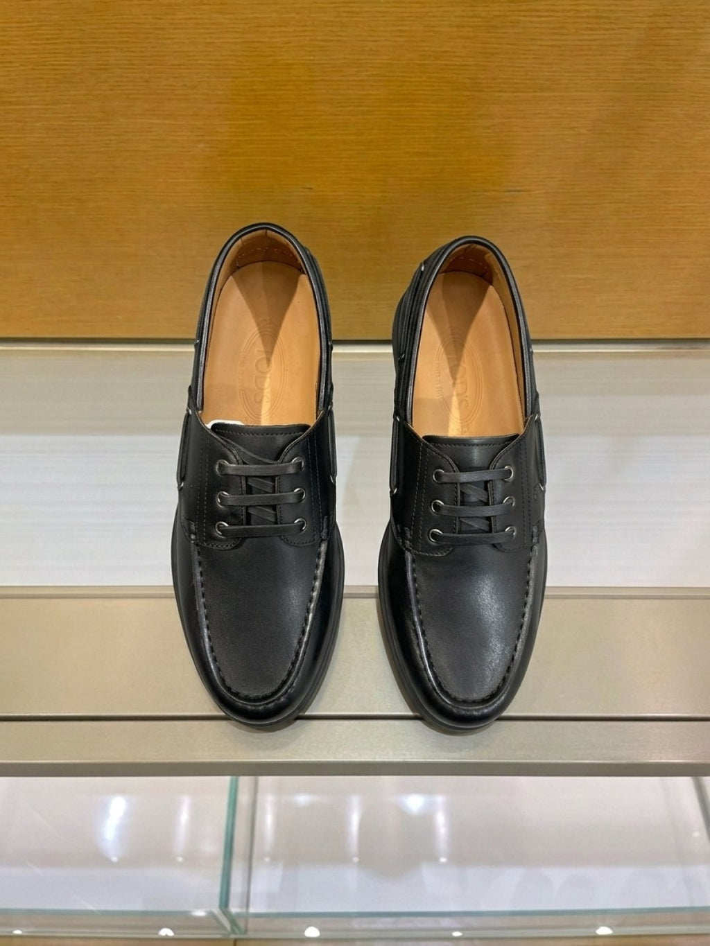 TOD'S Moc-Toe Boat Shoes — front