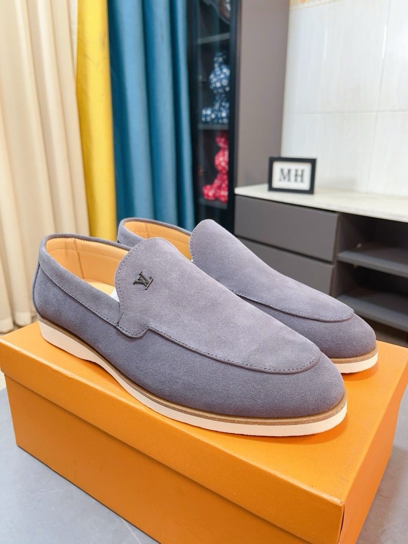 Louis Vuitton Textured Slip-On Loafers — front