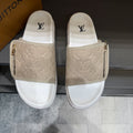 Louis Vuitton Embossed Zip Slide Sandals — hero