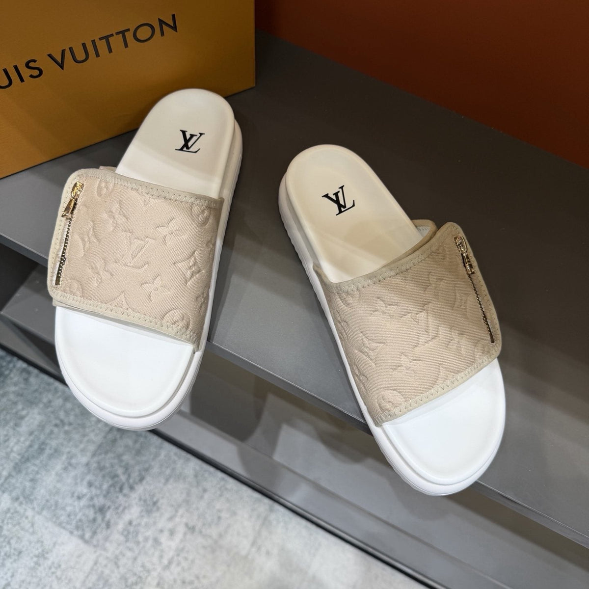 Louis Vuitton Embossed Zip Slide Sandals — front