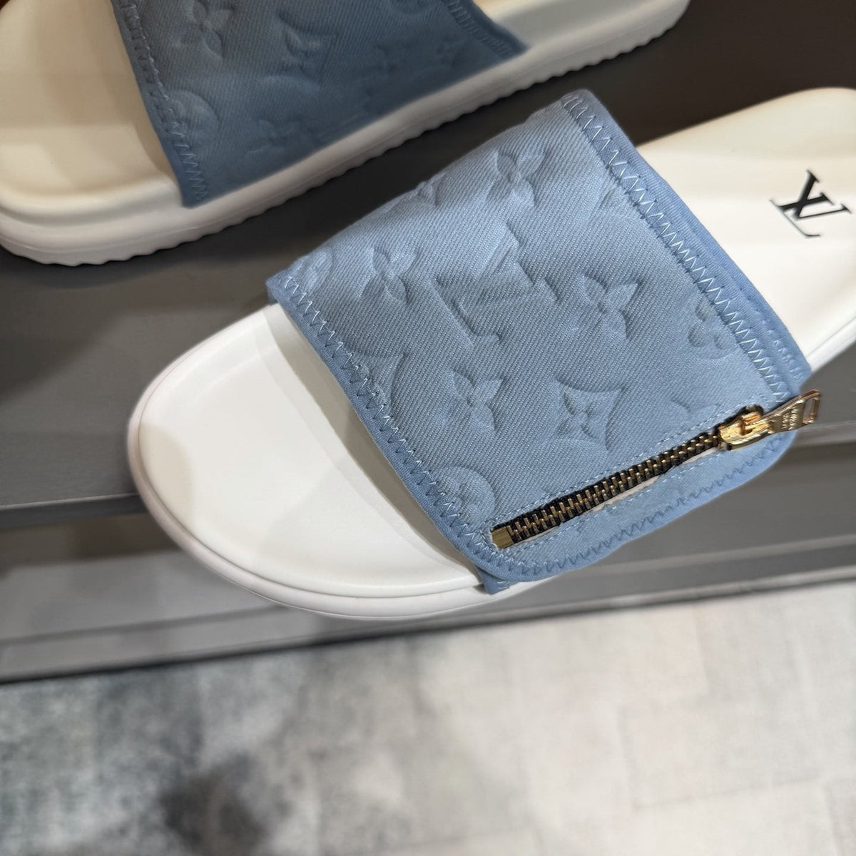 Louis Vuitton Embossed Zip Slide Sandals — detail