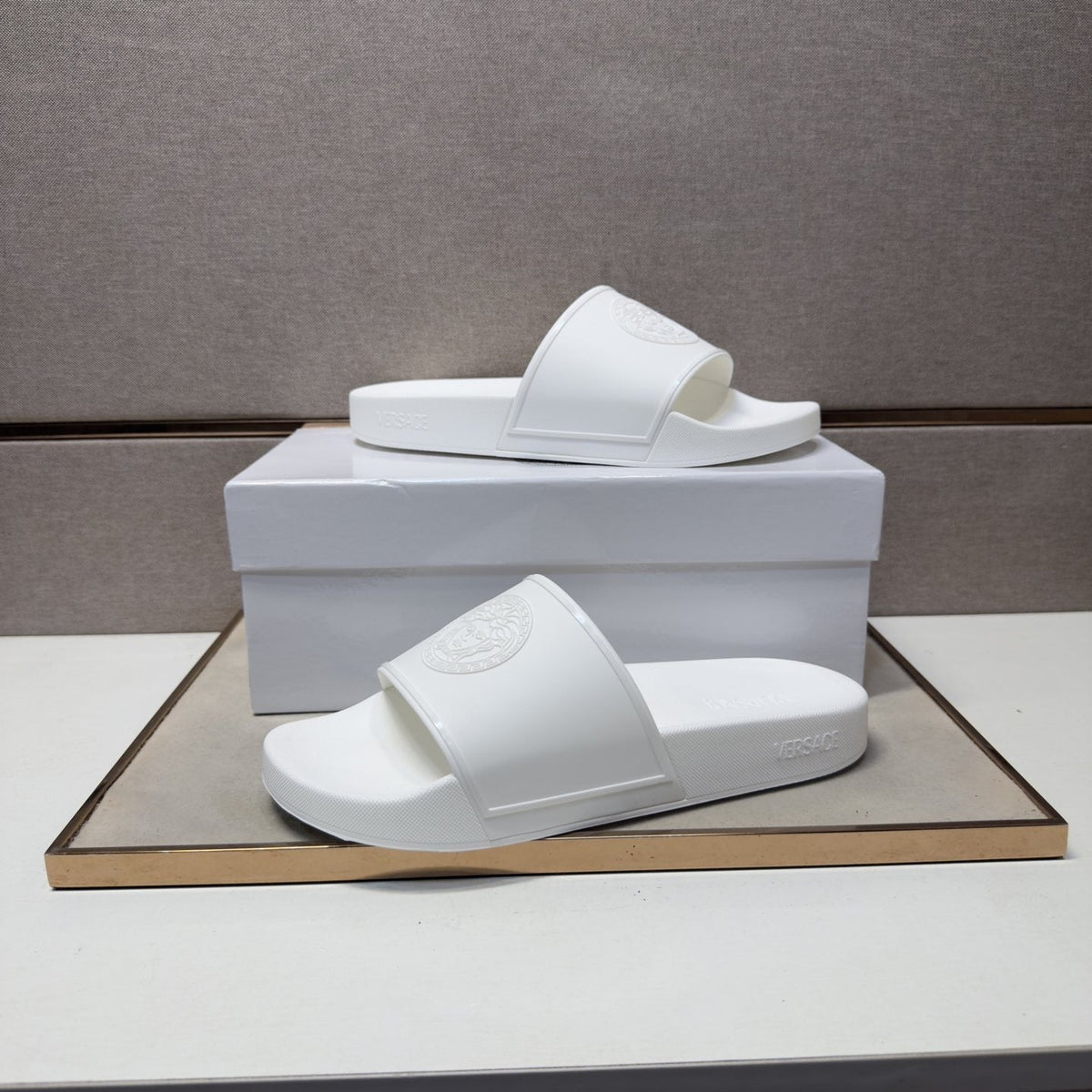 Versace Embossed Strap Slide Sandals — model