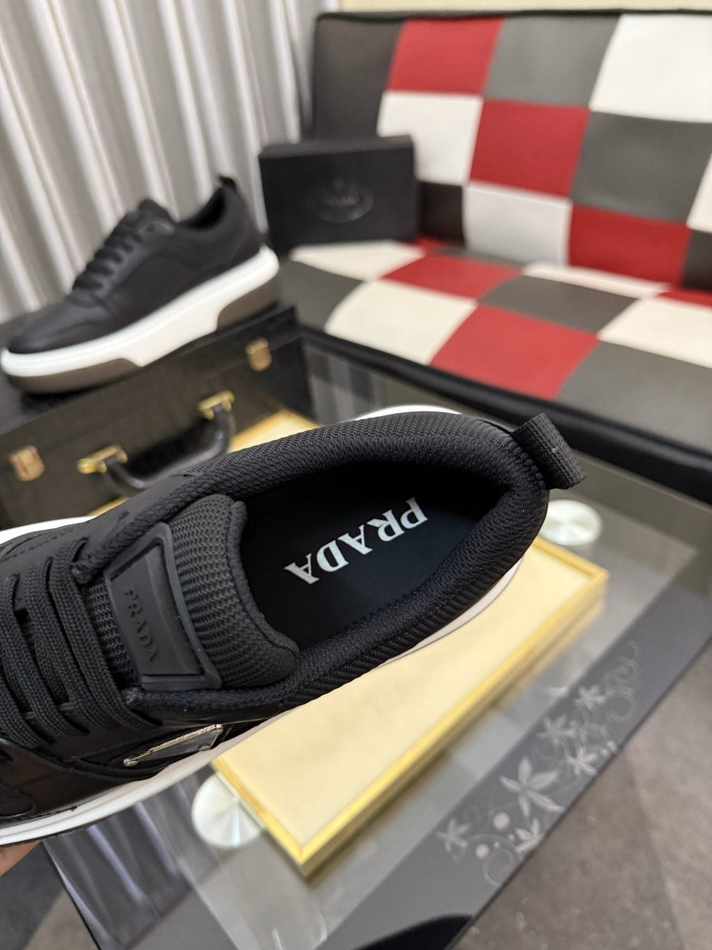 Prada Triangle Plaque Low-Top Sneakers — label