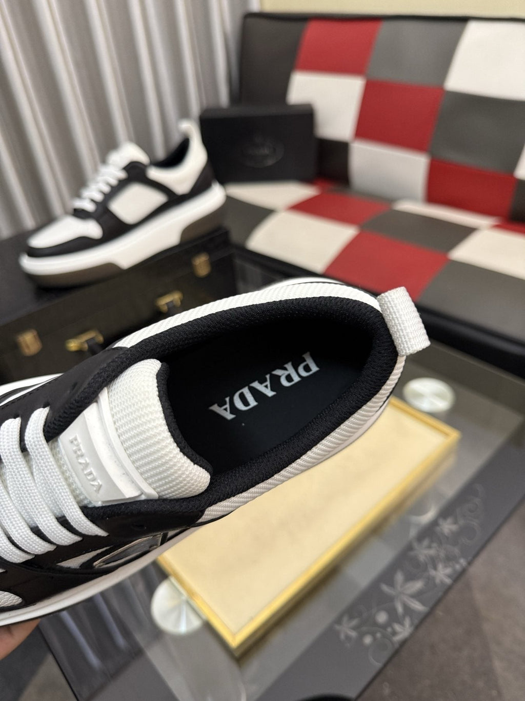 Prada Triangle Plaque Low-Top Sneakers — label