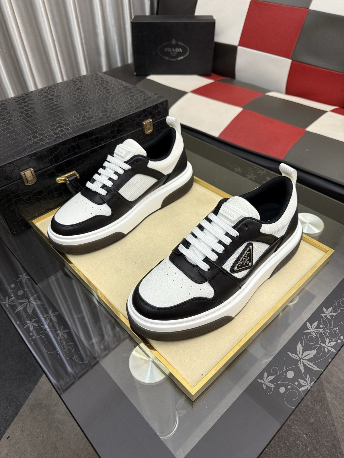 Prada Triangle Plaque Low-Top Sneakers — front