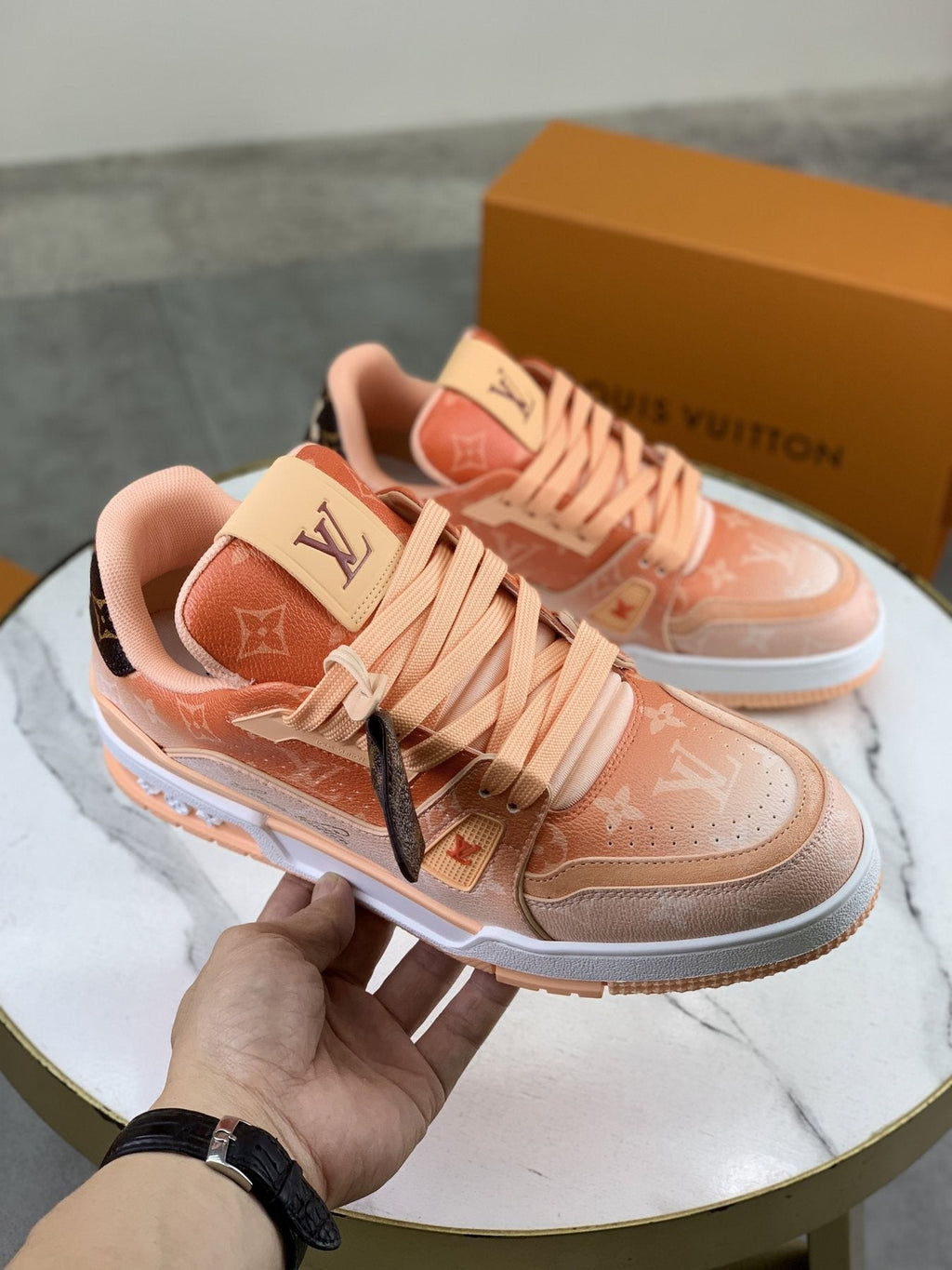 Louis Vuitton Peach Pink Monogram Low-Top Sneakers — model