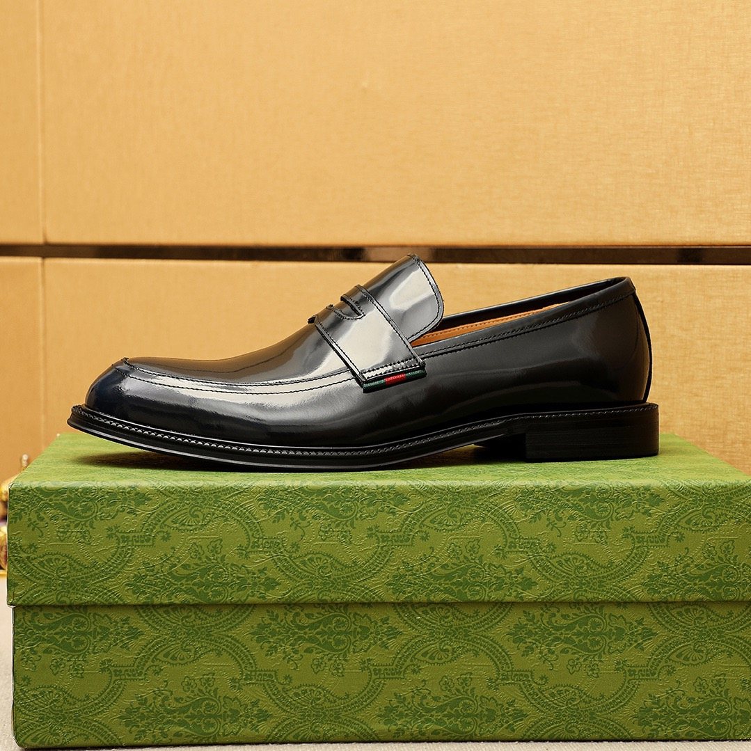 Gucci Polished Penny Loafers — side