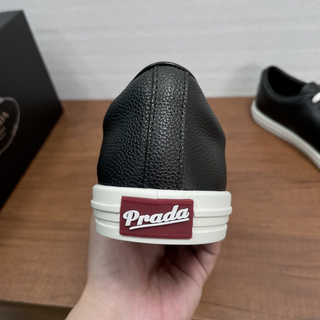 Prada Low-Top Lace-Up Sneakers — detail