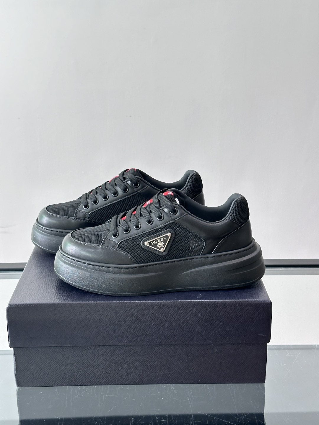 Prada Triangle Detail Low-Top Sneakers — front