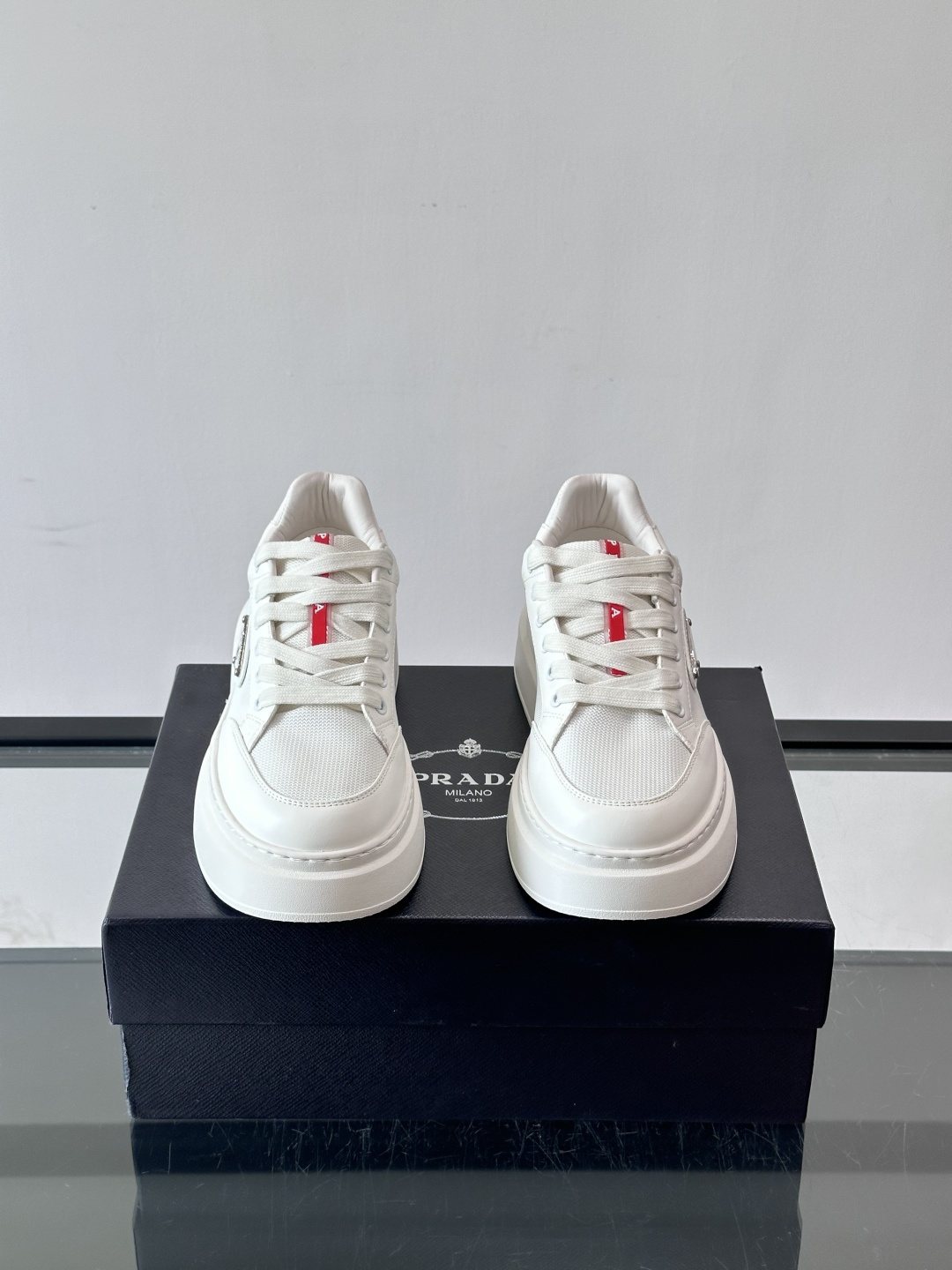 Prada Triangle Detail Low-Top Sneakers — front