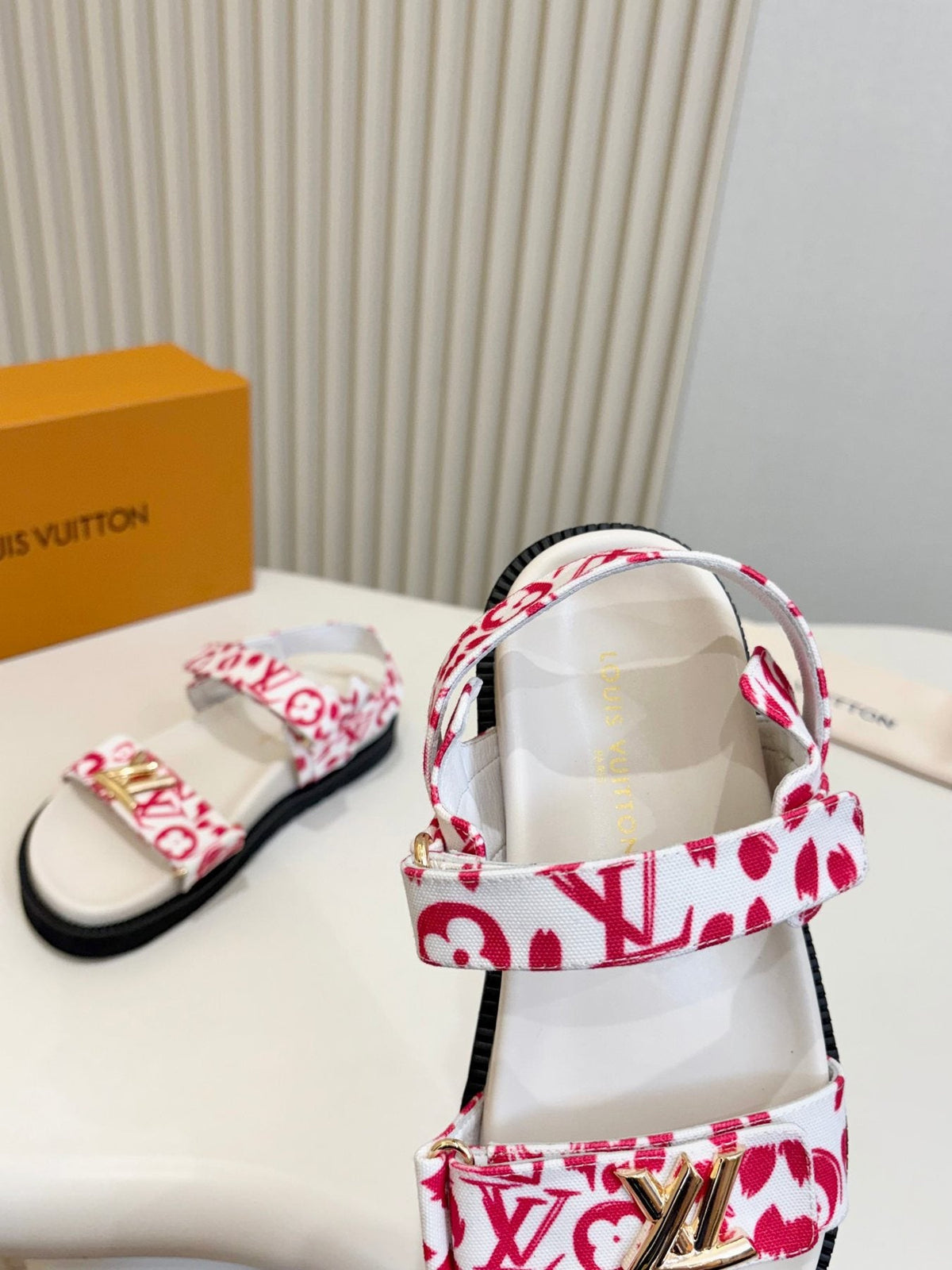 Louis Vuitton Patterned Two-Strap Slide Sandals — model