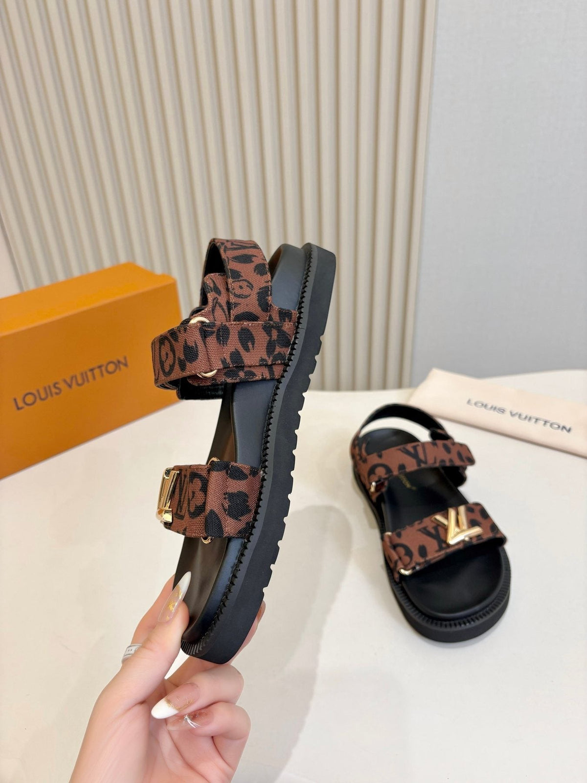 Louis Vuitton Patterned Two-Strap Slide Sandals — model