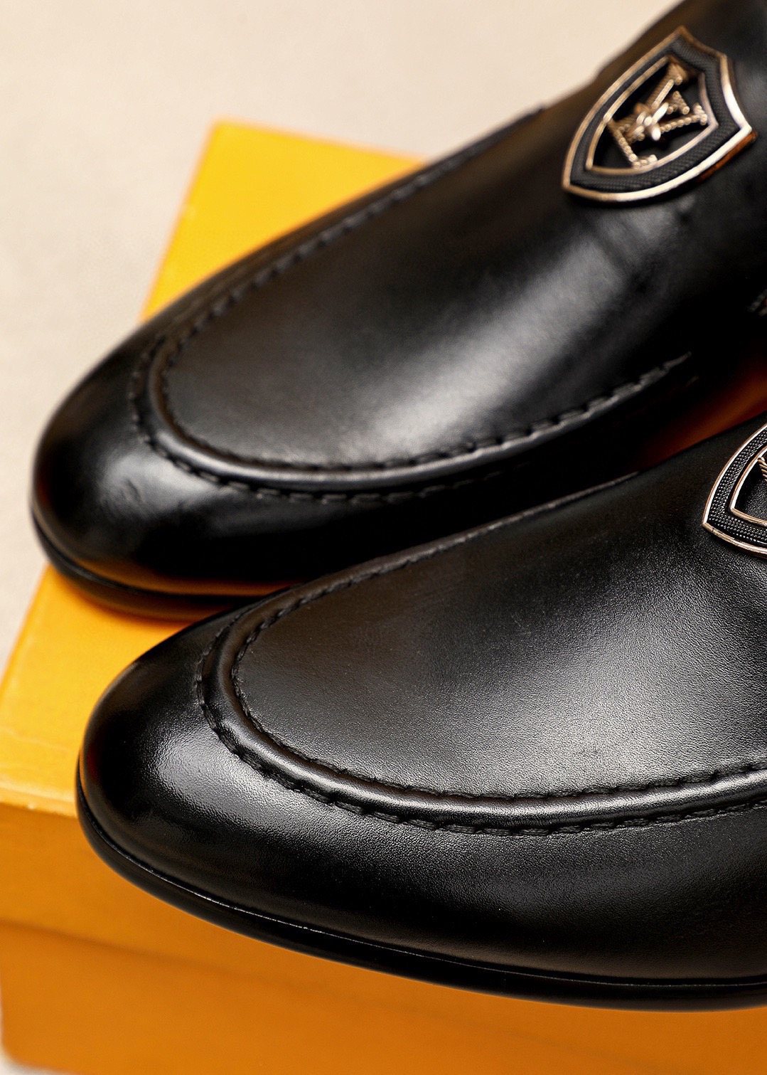 Louis Vuitton Shield-Detail Slip-On Shoes — detail
