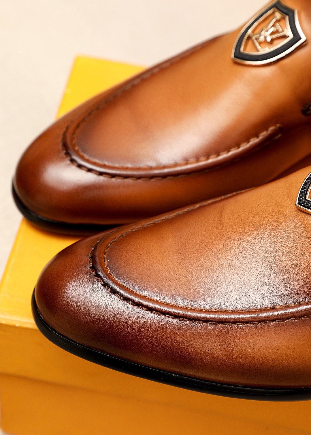 Louis Vuitton Shield-Detail Slip-On Shoes — detail
