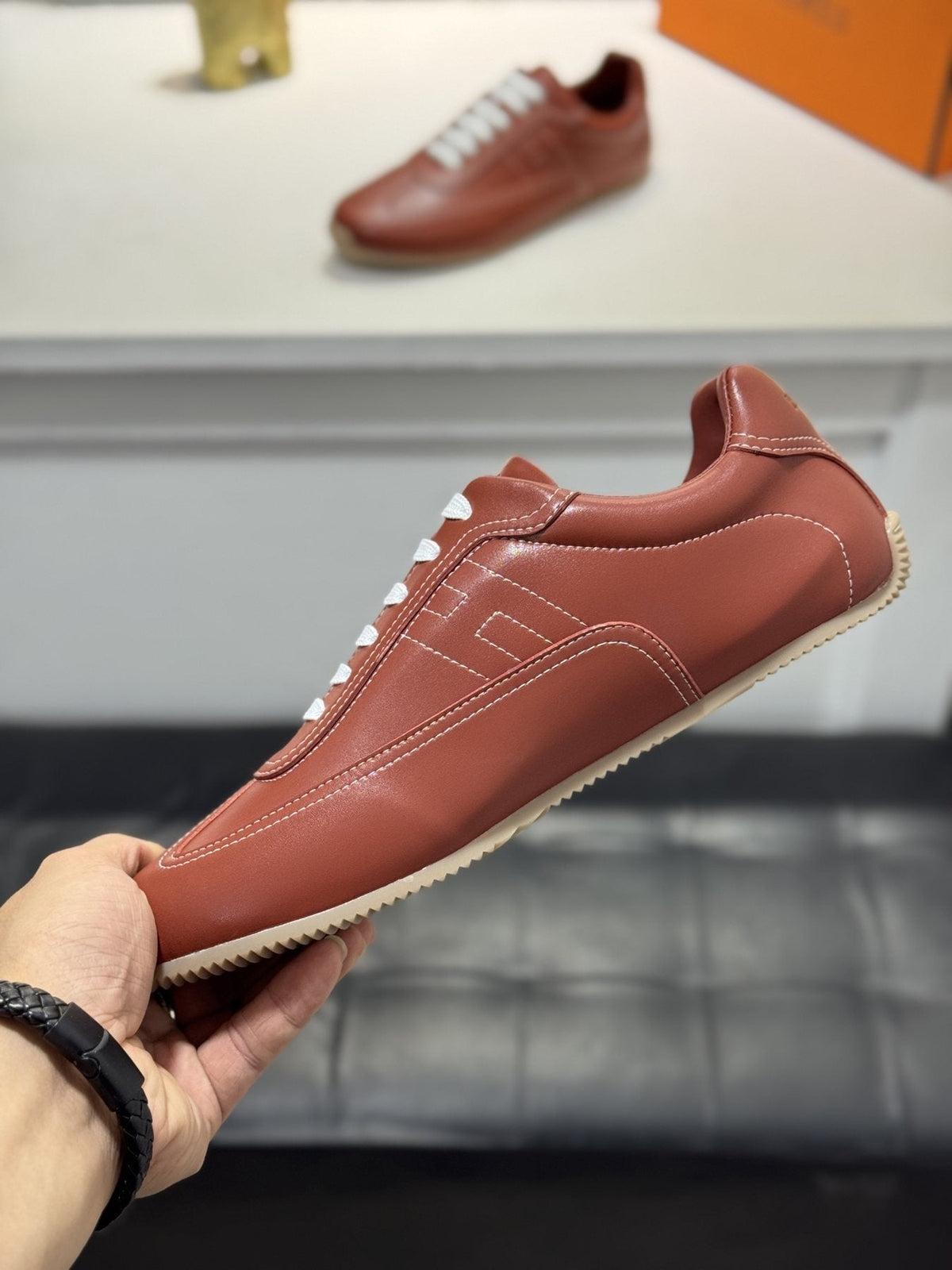 Hermès Contrast-Trim Low-Top Sneakers — side