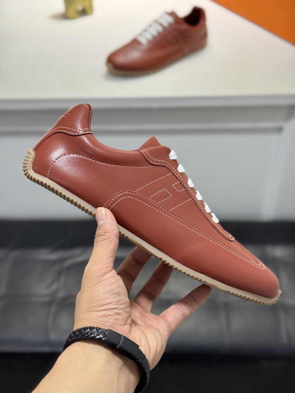 Hermès Contrast-Trim Low-Top Sneakers — side