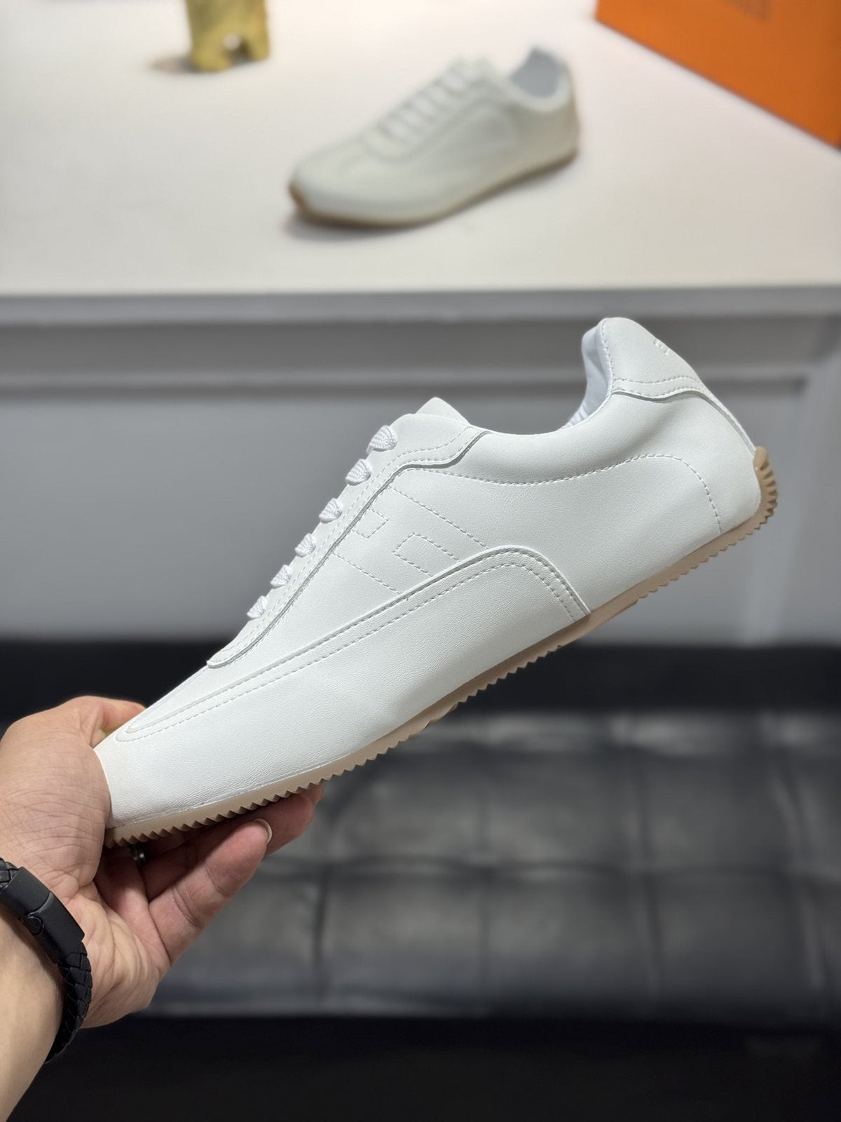 Hermès Contrast-Trim Low-Top Sneakers — side