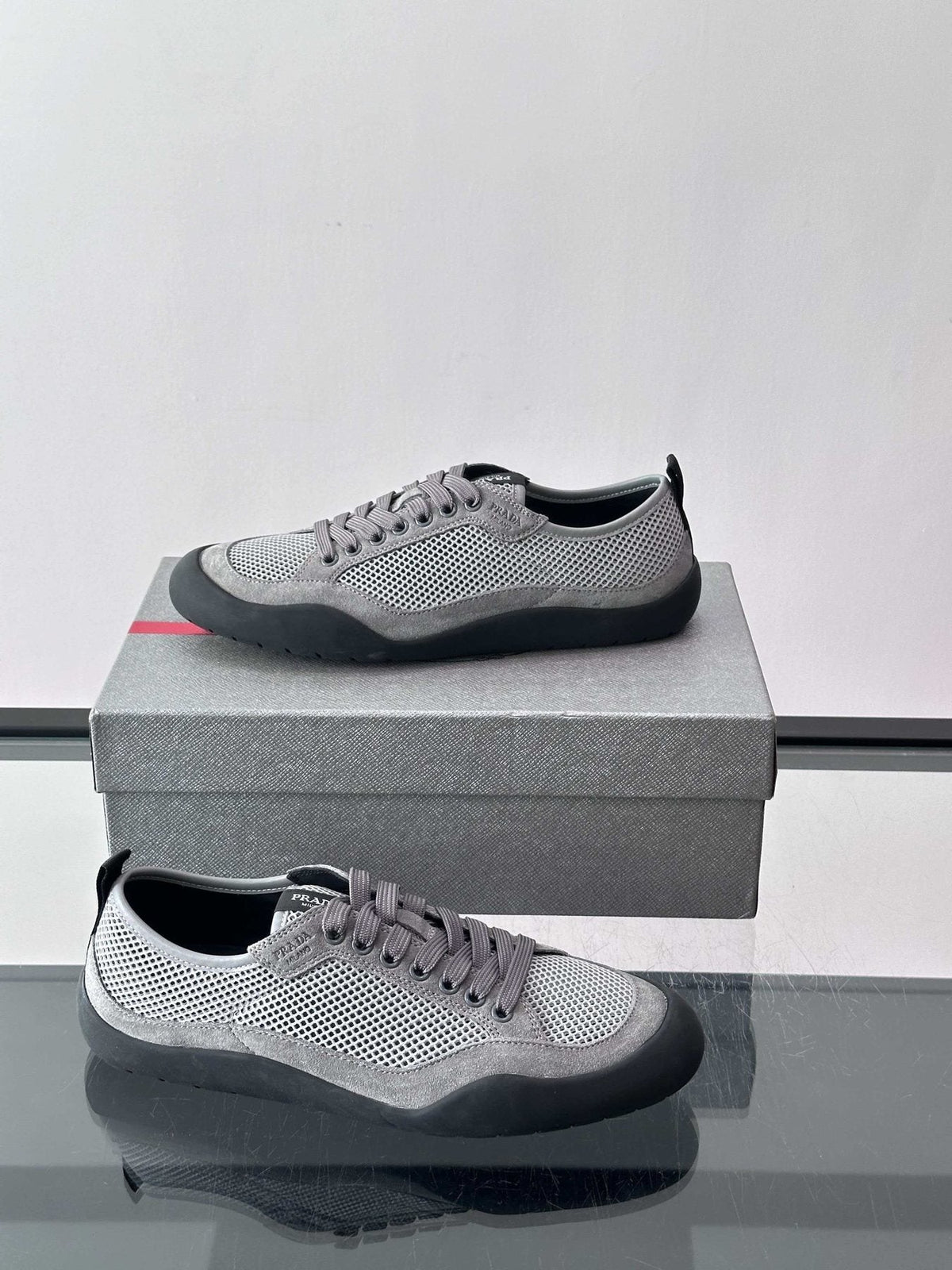 Prada Low-Top Perforated Sneakers — side