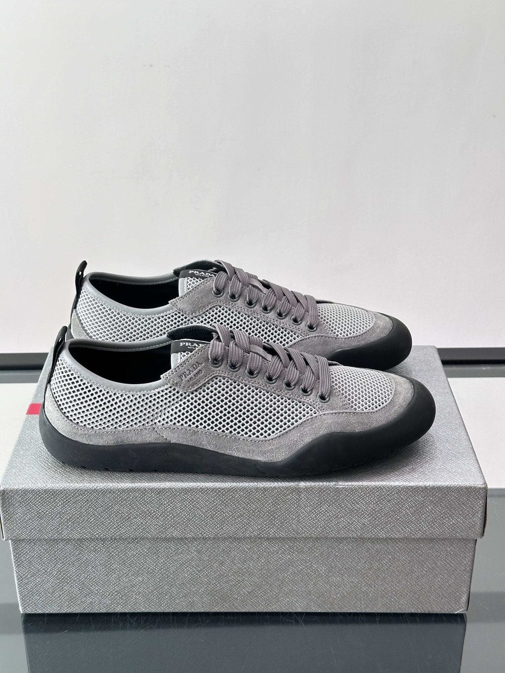 Prada Low-Top Perforated Sneakers — front