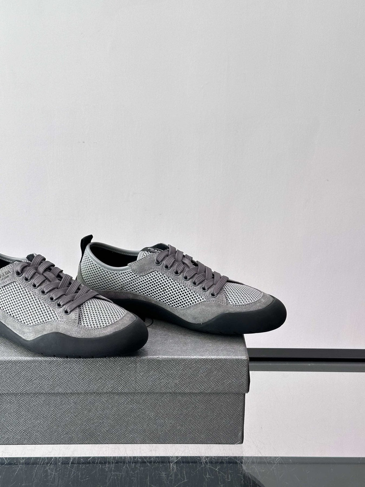 Prada Low-Top Perforated Sneakers — side