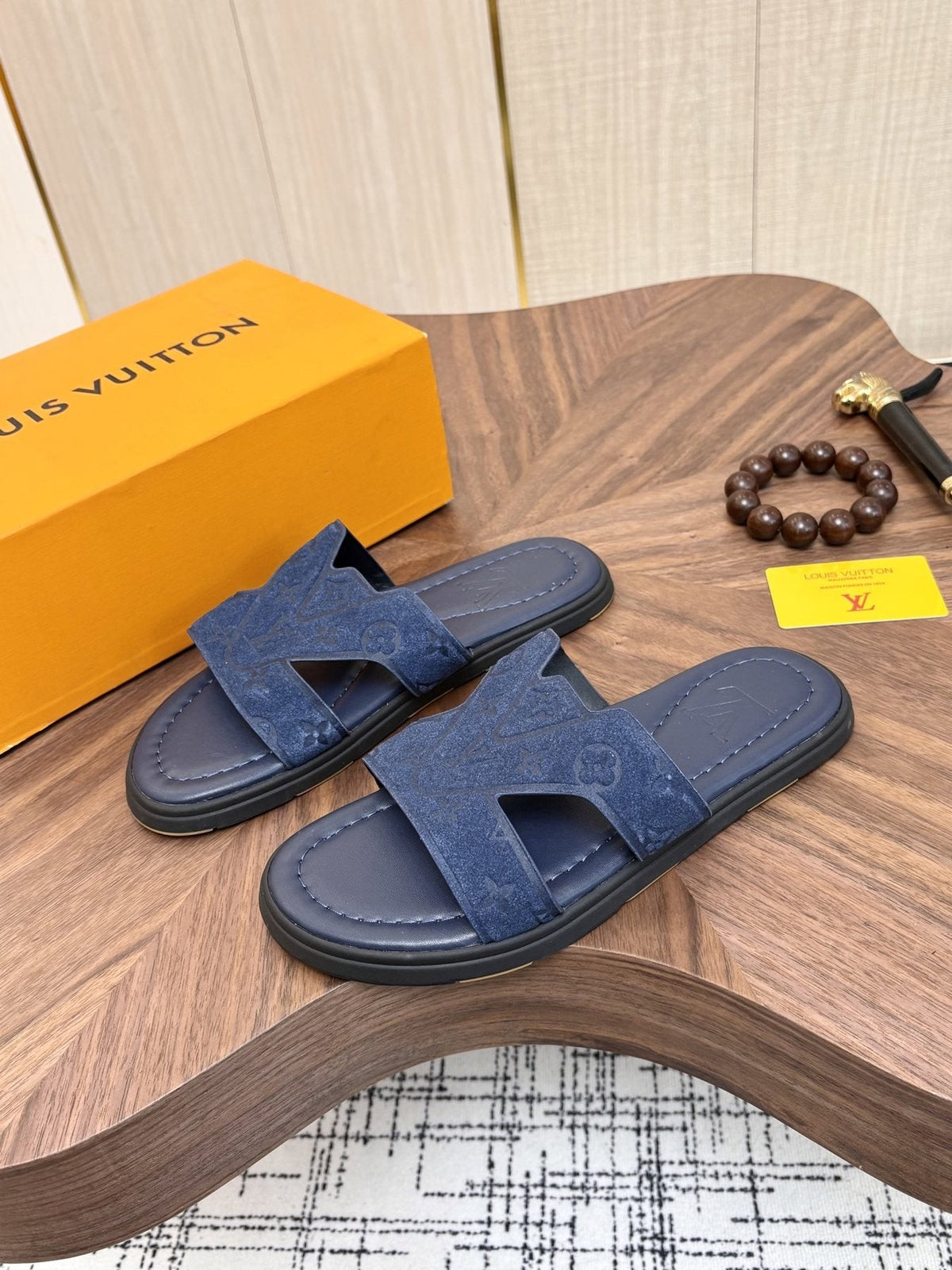 Louis Vuitton Embossed Navy Blue Slide Sandals — front